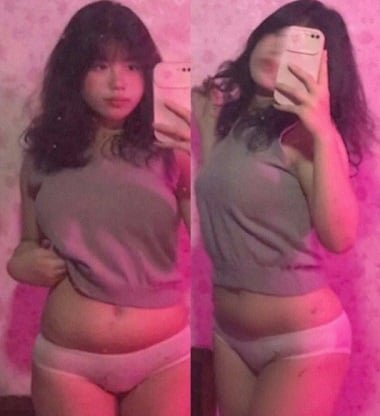 Em xinh tươi mặc áo ngắn thích kêu lên khi uống nước